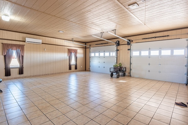 garage featuring a wall mounted AC