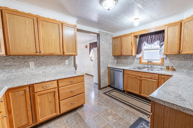 kitchen featuring sink, a textured ceiling, white refrigerator, stainless steel dishwasher, and backsplash