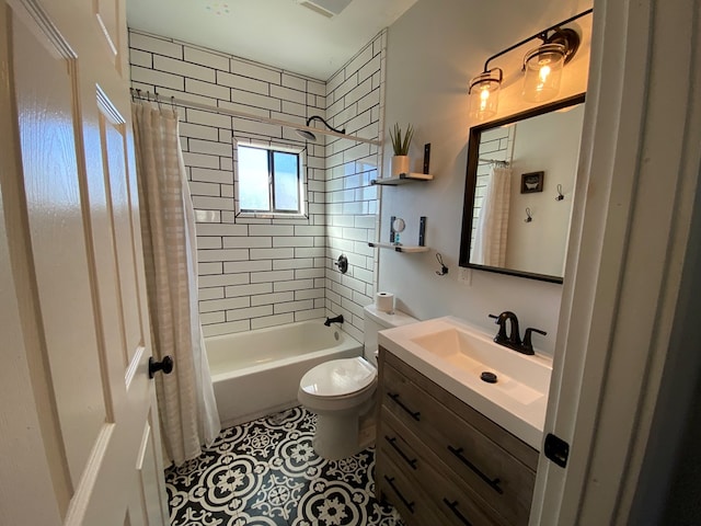 full bathroom featuring tile patterned flooring, shower / bath combination with curtain, vanity, and toilet