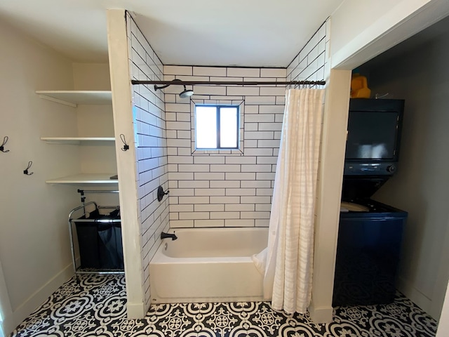 bathroom with shower / tub combo and tile patterned floors