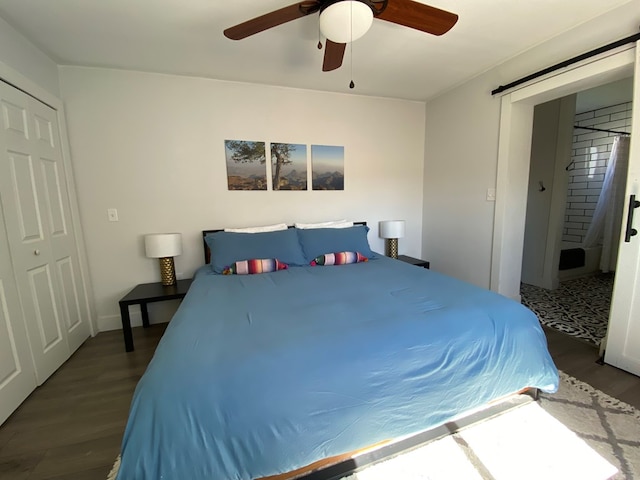 bedroom with wood-type flooring, a closet, and ceiling fan