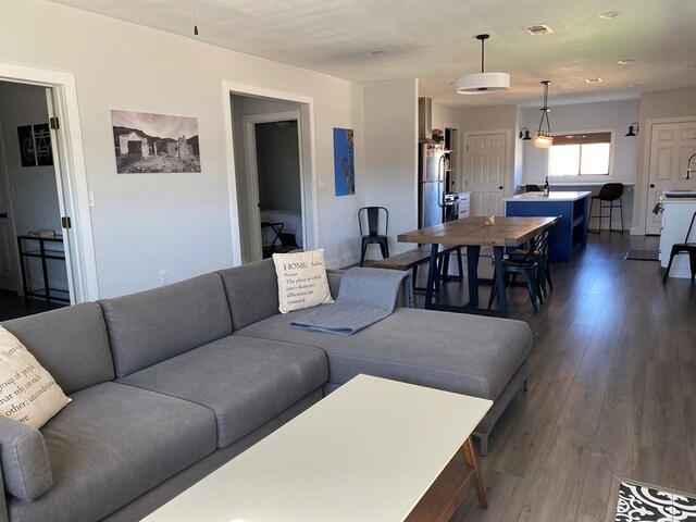 living room with dark wood-type flooring