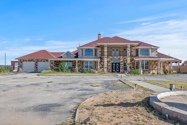 view of front of property with a garage