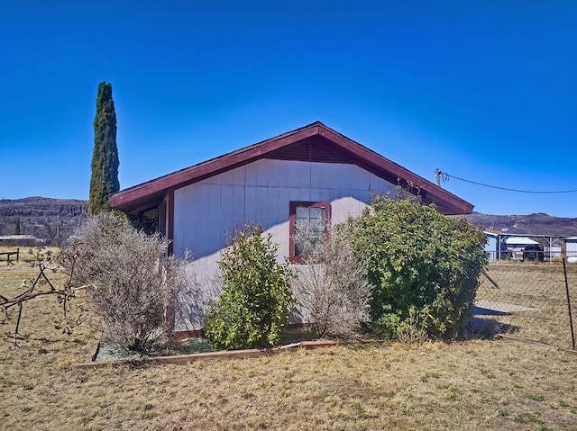 view of side of property featuring a mountain view