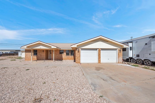 single story home featuring a garage