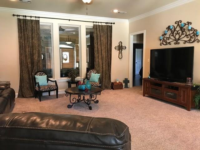 living room with crown molding and light colored carpet