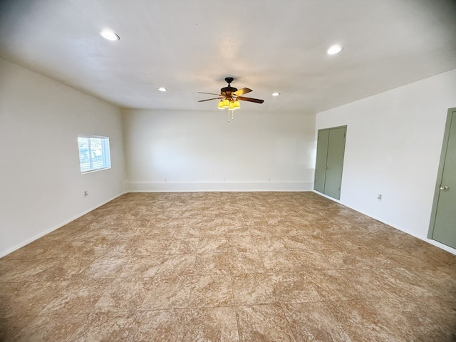 unfurnished room with recessed lighting, baseboards, and ceiling fan