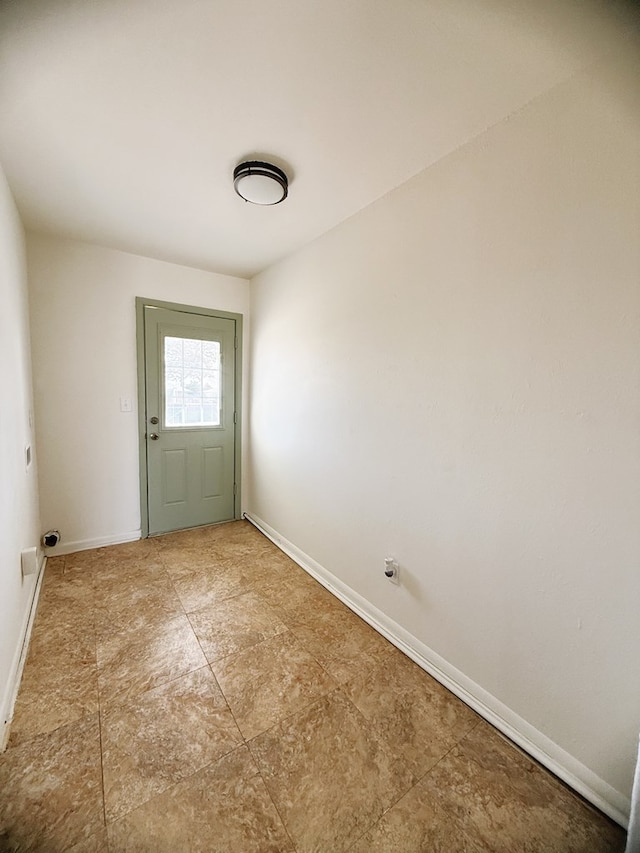 doorway with baseboards