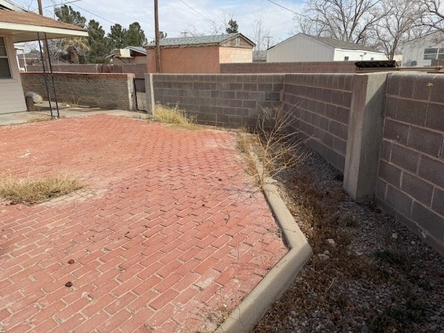 view of yard with fence private yard and a gate