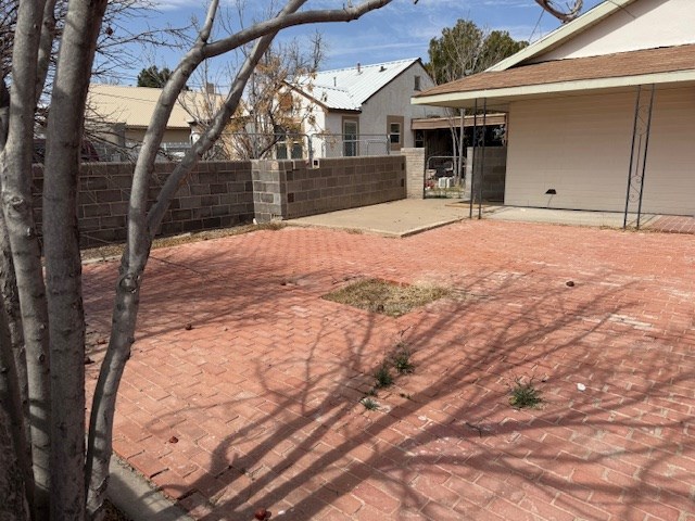 view of patio with fence