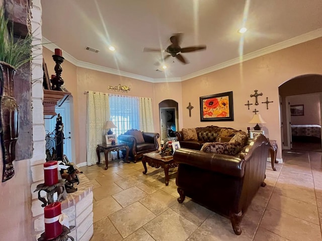 living room featuring crown molding and ceiling fan