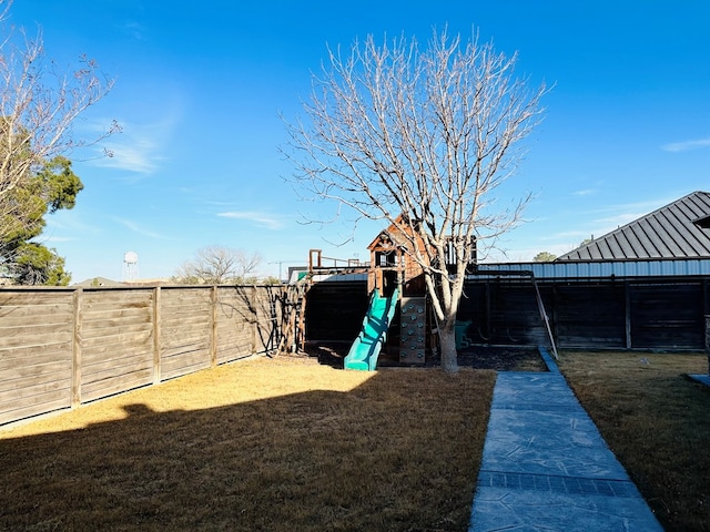 view of yard with a playground