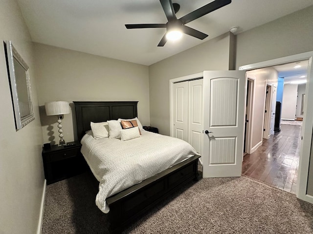 bedroom featuring carpet floors, a closet, and ceiling fan