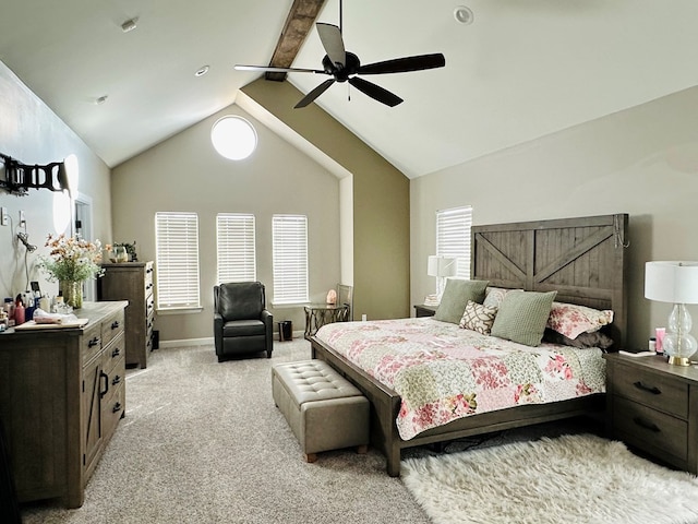 bedroom featuring lofted ceiling with beams, light colored carpet, and ceiling fan