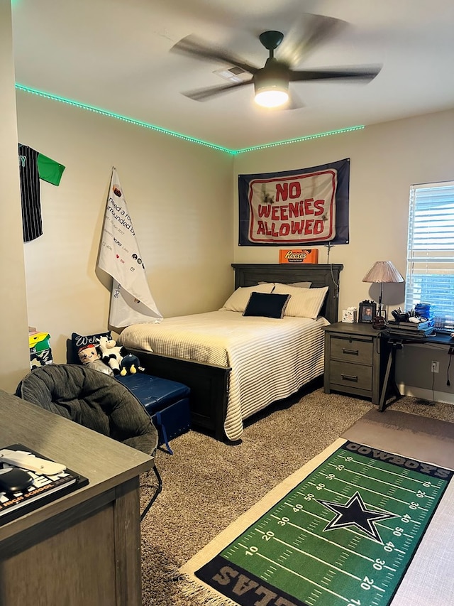 bedroom with carpet floors and ceiling fan