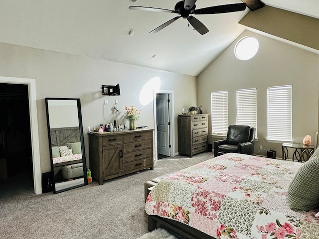 carpeted bedroom with vaulted ceiling and ceiling fan