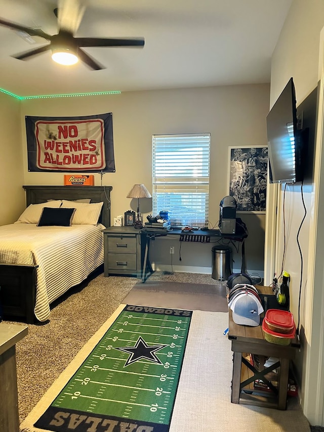 carpeted bedroom with ceiling fan