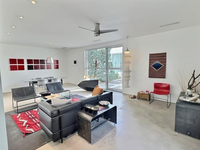 living room with ceiling fan