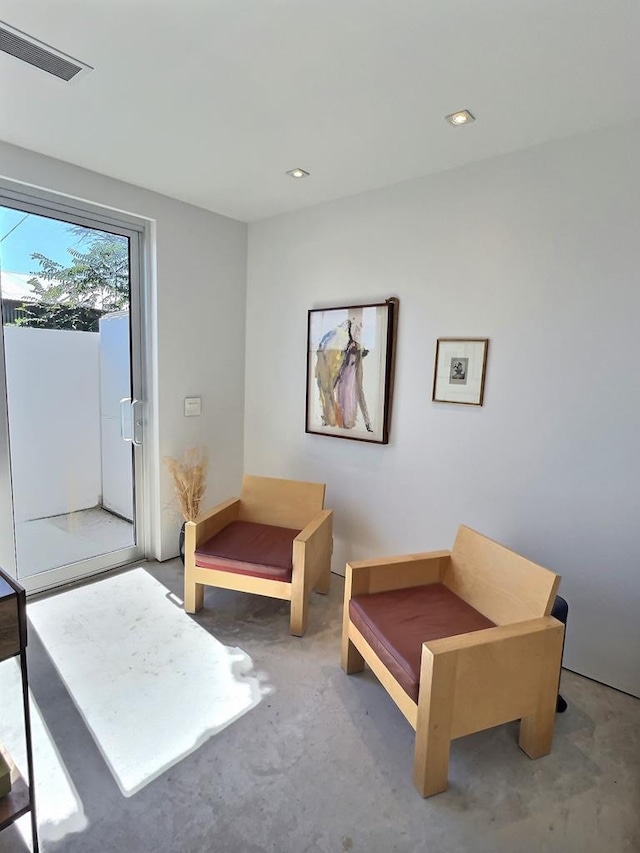 sitting room with concrete floors