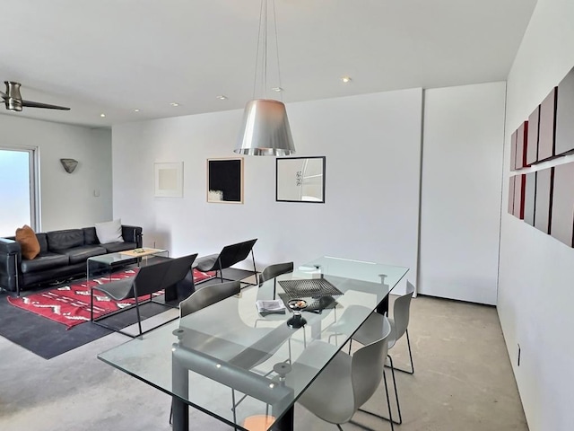 dining space featuring ceiling fan