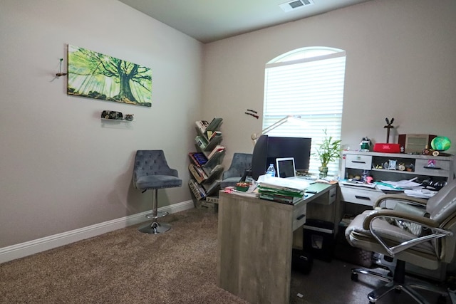 office with carpet flooring, visible vents, and baseboards