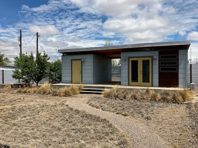 back of house with french doors