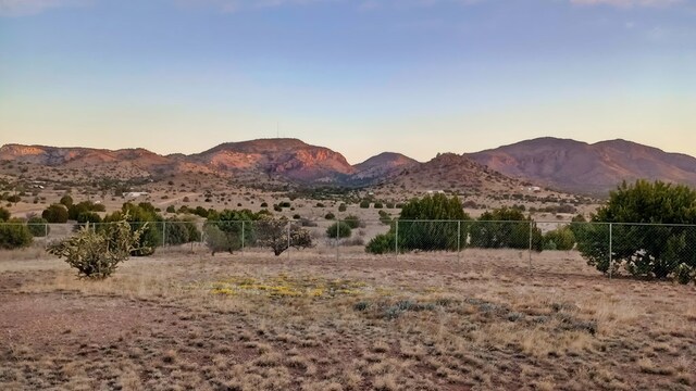 property view of mountains featuring a rural view