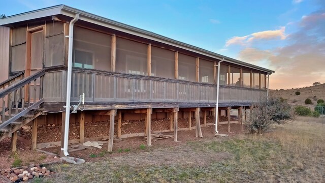 view of property exterior at dusk