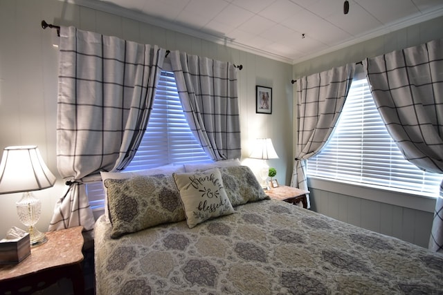 bedroom with ornamental molding