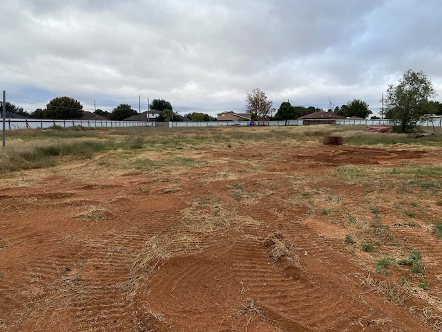 view of yard with a rural view