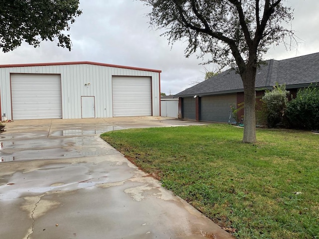 garage with a lawn