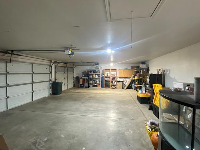 garage featuring a garage door opener