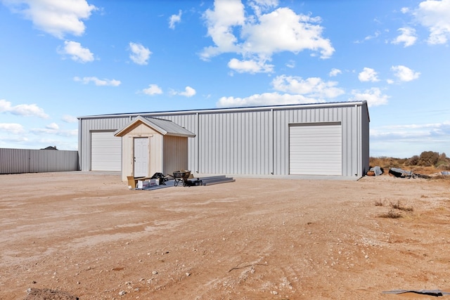 view of outdoor structure with a garage