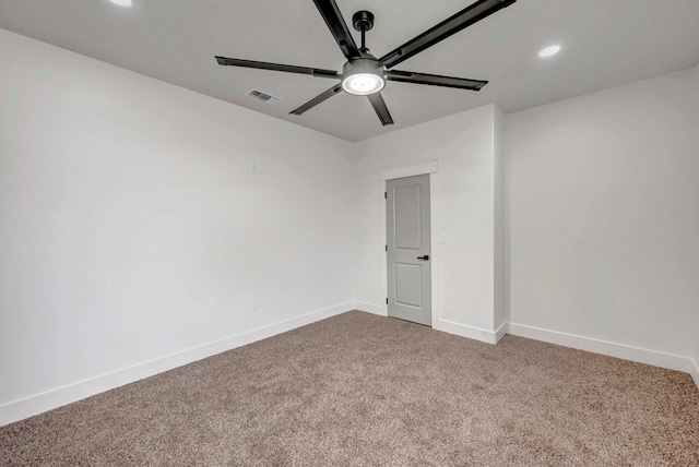 unfurnished room featuring a ceiling fan, carpet, visible vents, baseboards, and recessed lighting