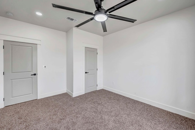 unfurnished bedroom with visible vents, a ceiling fan, recessed lighting, carpet floors, and baseboards