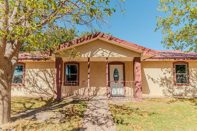 view of front of home featuring covered porch