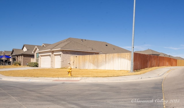 exterior space with a garage