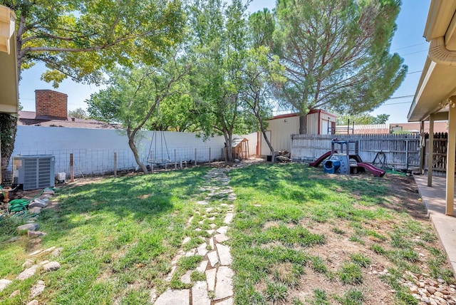 view of yard featuring a fenced backyard and cooling unit