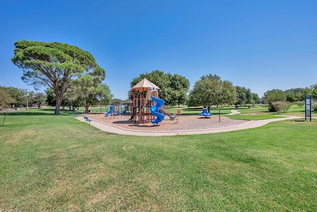 community playground featuring a yard