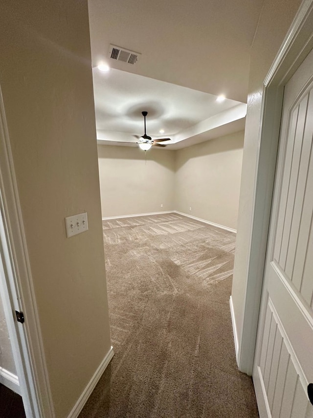 empty room with carpet, visible vents, baseboards, recessed lighting, and ceiling fan