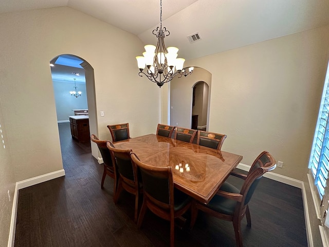 dining space with visible vents, dark wood finished floors, arched walkways, vaulted ceiling, and a chandelier