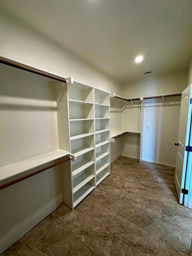 spacious closet with visible vents