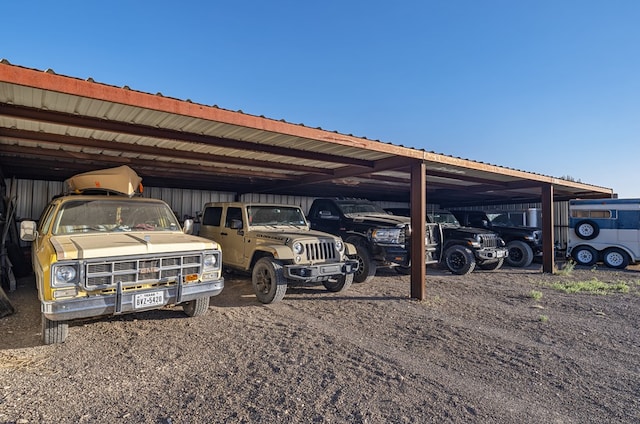 view of parking / parking lot with a carport