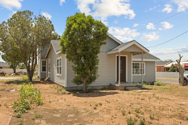 view of front of property with fence