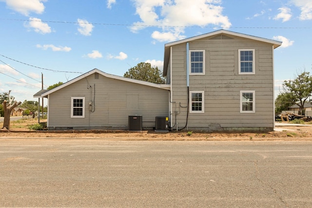 view of side of home with cooling unit