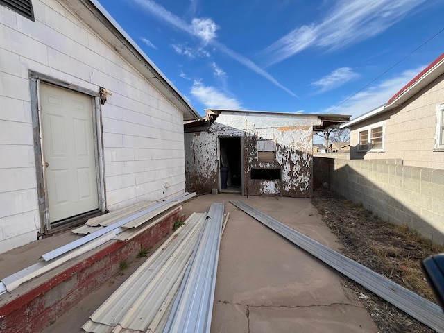 view of patio featuring fence