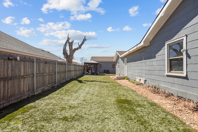 view of yard with fence