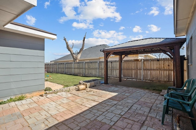 view of patio / terrace with a gazebo and fence private yard