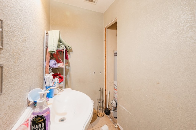 bathroom featuring tile patterned flooring