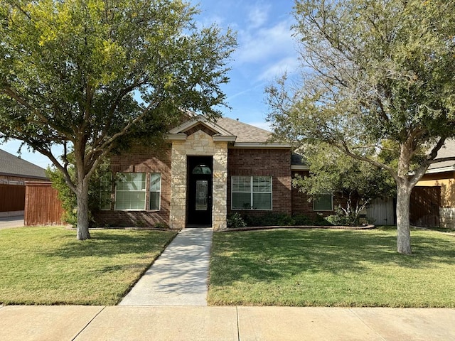 view of front of home with a front lawn